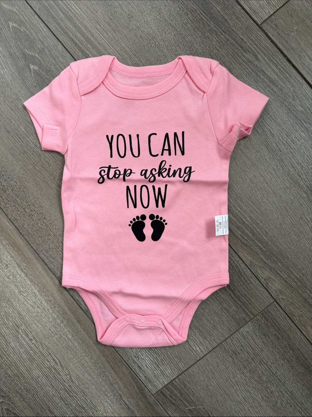 Pink Baby Bodysuit with 'You Can Stop Asking Now' Graphic